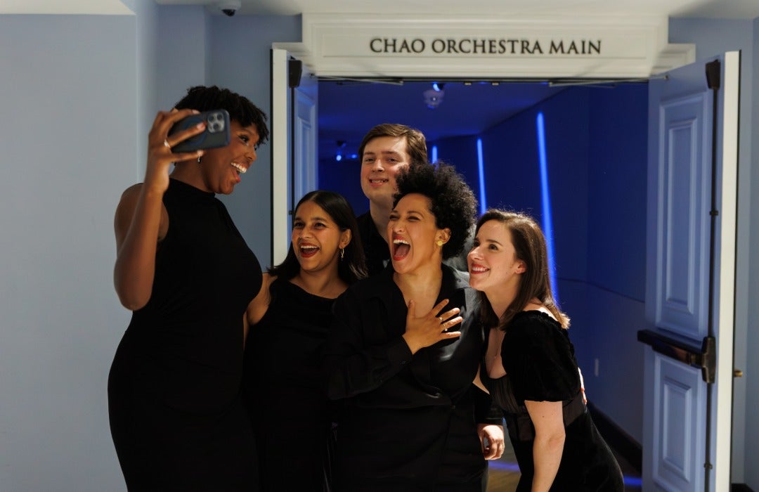 Julia Bullock taking photos with Shepherd School students