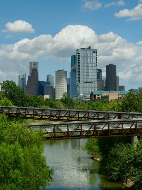 Houston skyline seen from Buffalo Bayou, reflecting the region’s growth, resilience and evolving priorities highlighted in the 2026 Kinder Houston Area Survey.