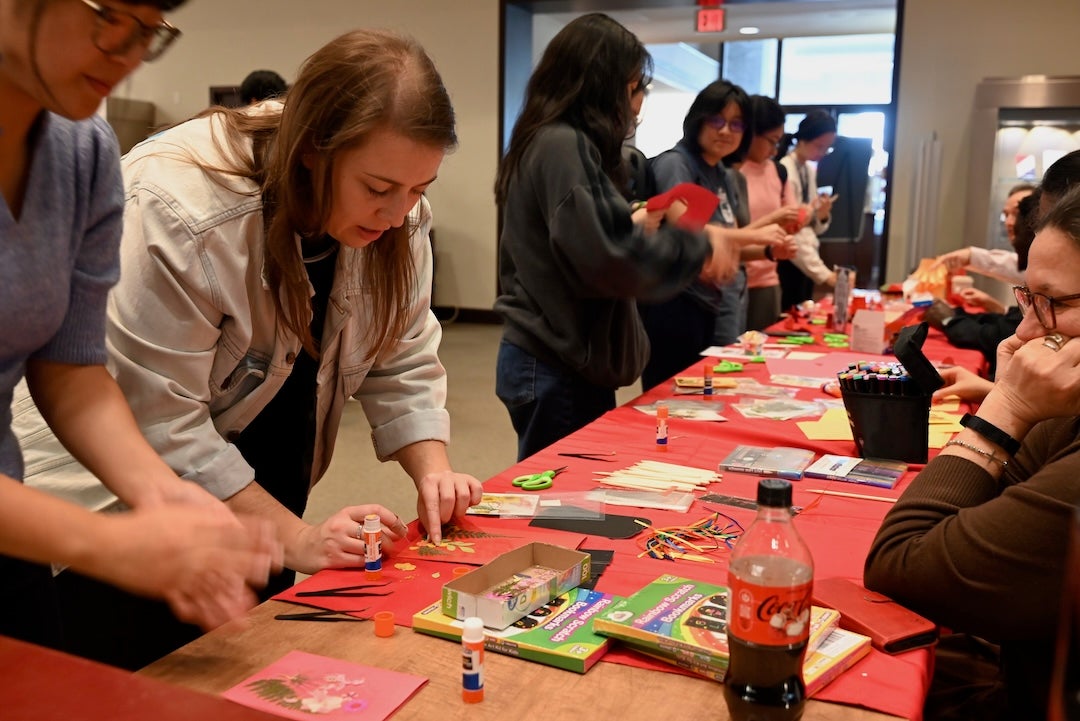 Red lanterns, bright paper crafts and the click of chopsticks filled the first-floor lobby of Fondren Library Feb. 17 as Rice University students, faculty and staff gathered to celebrate the Lunar New Year and welcome the Year of the Horse.