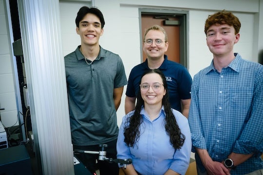The research team poses for a group photo in the lab
