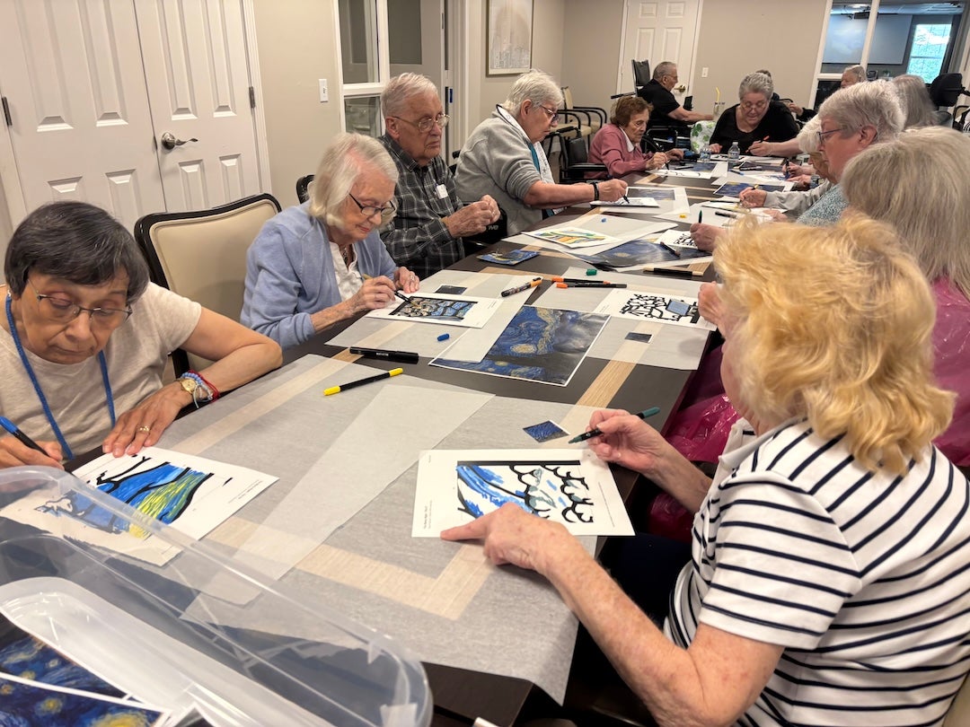 A group of Belmont residents attend a painting course as part of Rice University's Lifelong University program.