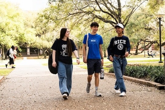 Rice students walk on campus