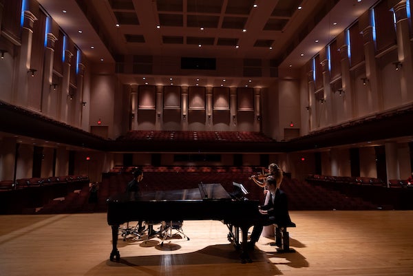 Clara Saitkoulov performs on the Stradivarius violin alongside a pianist and percussionist . Photo by Brandon Martin.