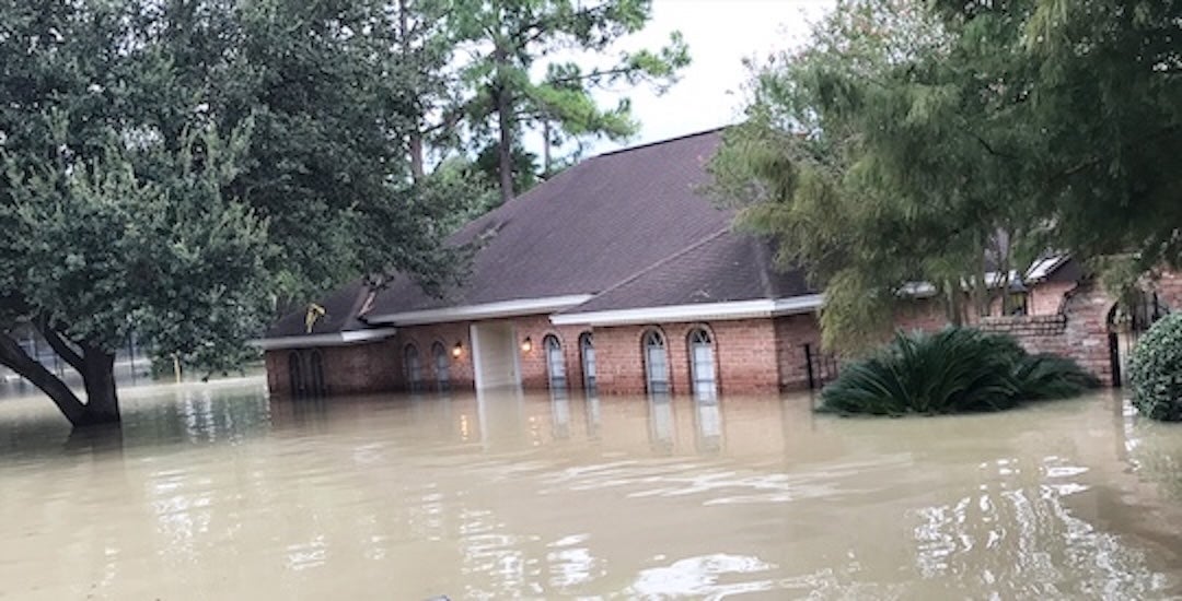 A flooded home in Harris County, where rising climate risks are impacting housing stability.