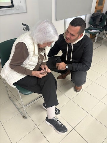 Craig Considine with Ruth Bellinger, an Israeli citizen and Holocaust survivor of the Warsaw Ghetto.