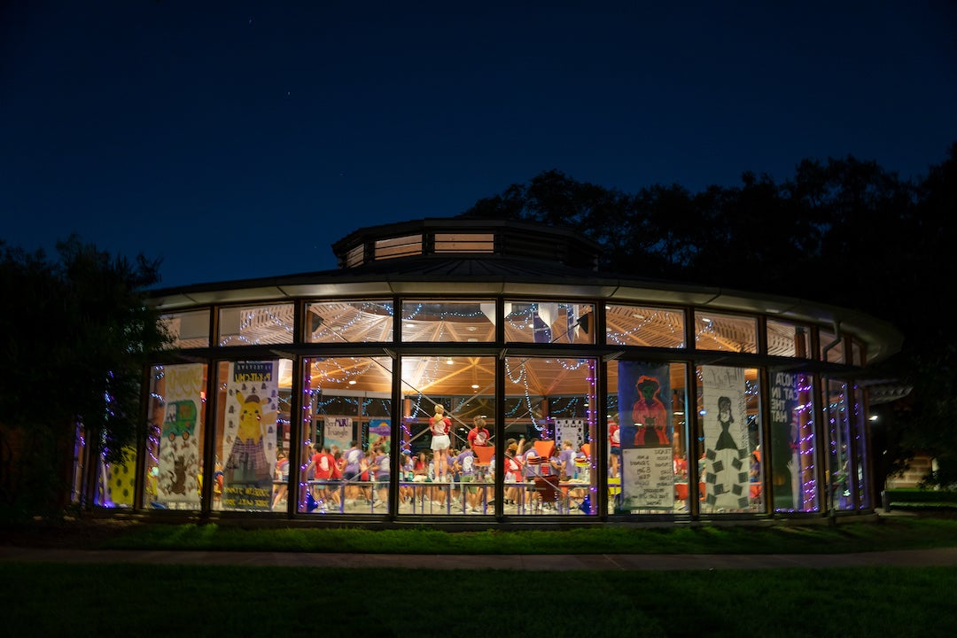 View of McMurty College at night during O-Week