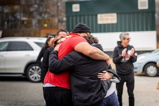 Gary Benloss celebrates with supporters after his release from prison following 26 years of incarceration. The Making an Exoneree program contributed to advocacy efforts surrounding his case.