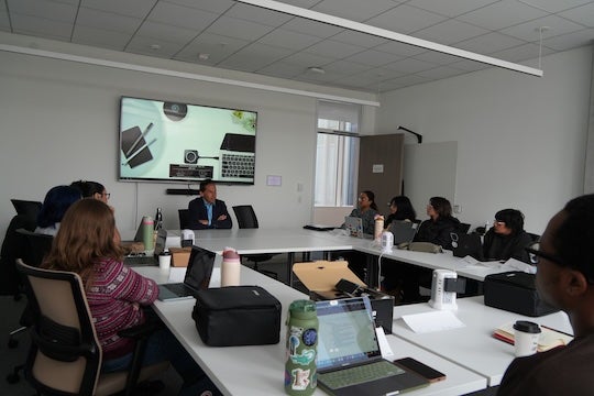 Marc Howard speaks with students in the Making an Exoneree course during a visit to Rice University.