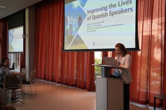 Rachel Kimbro, dean of Rice University's School of Social Sciences, welcomes attendees to the Texas-Latin America Social Science Forum on Language and Opportunity