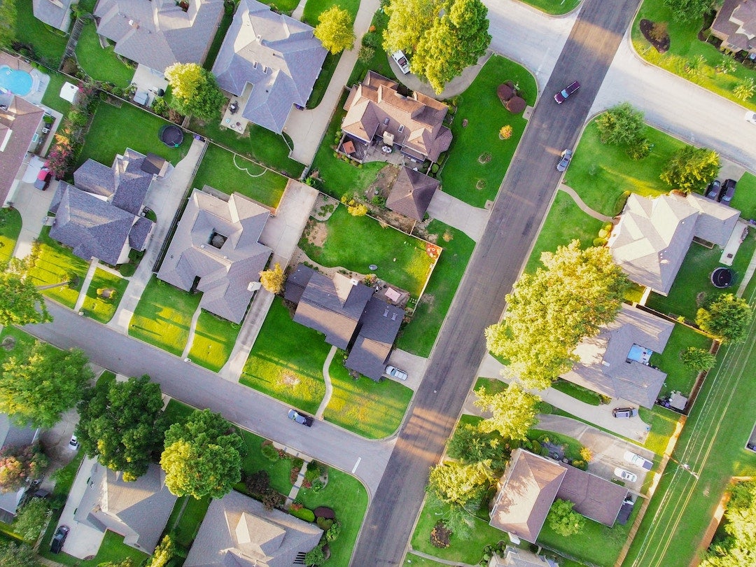 Aerial photo of houses. Credit: J. King/Unsplash. 
