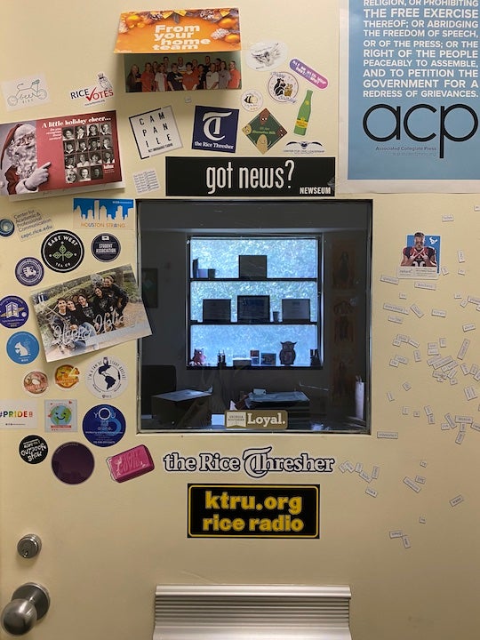 The door to Kelley Lash's office in the student center, decorated with stickers and cards