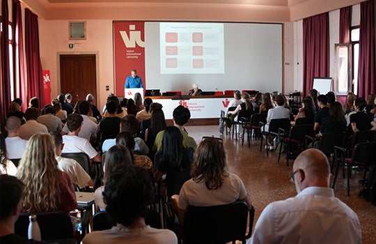 Luis Campos making a presentation during orientation at Venice International University