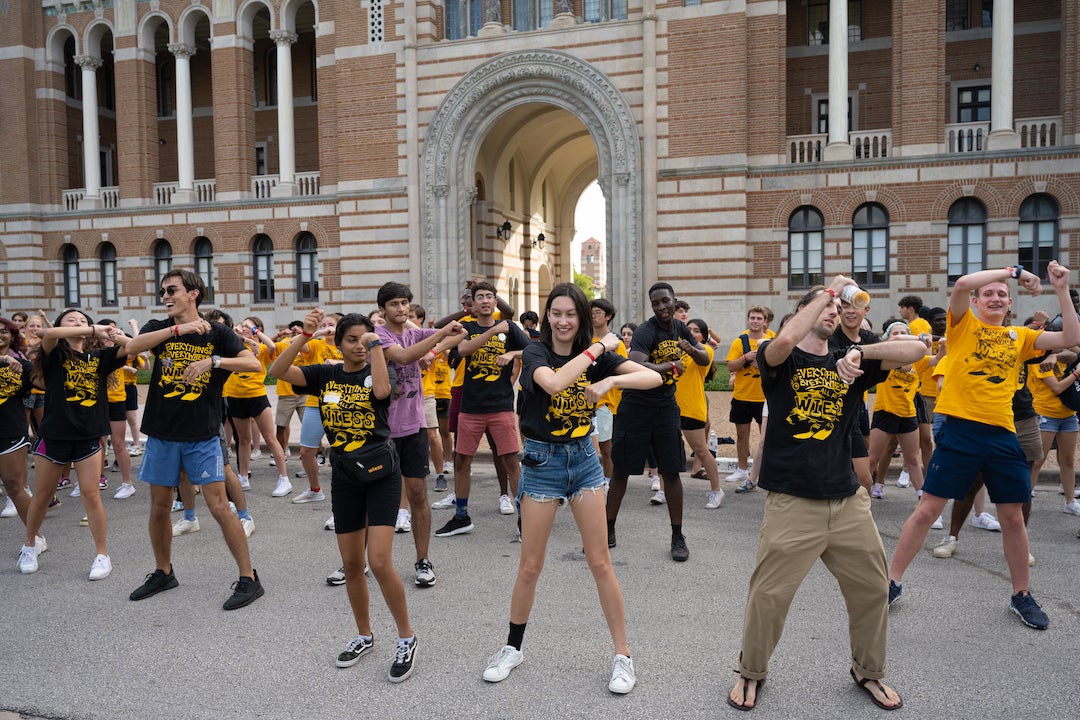 Students dancing in front of the Sallyport during president's barbecue