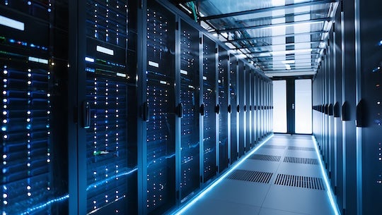 Stock image of a data center server room. 