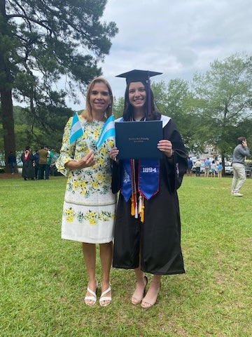 Urbina and her mother at her graduation from Louisiana Tech University. 