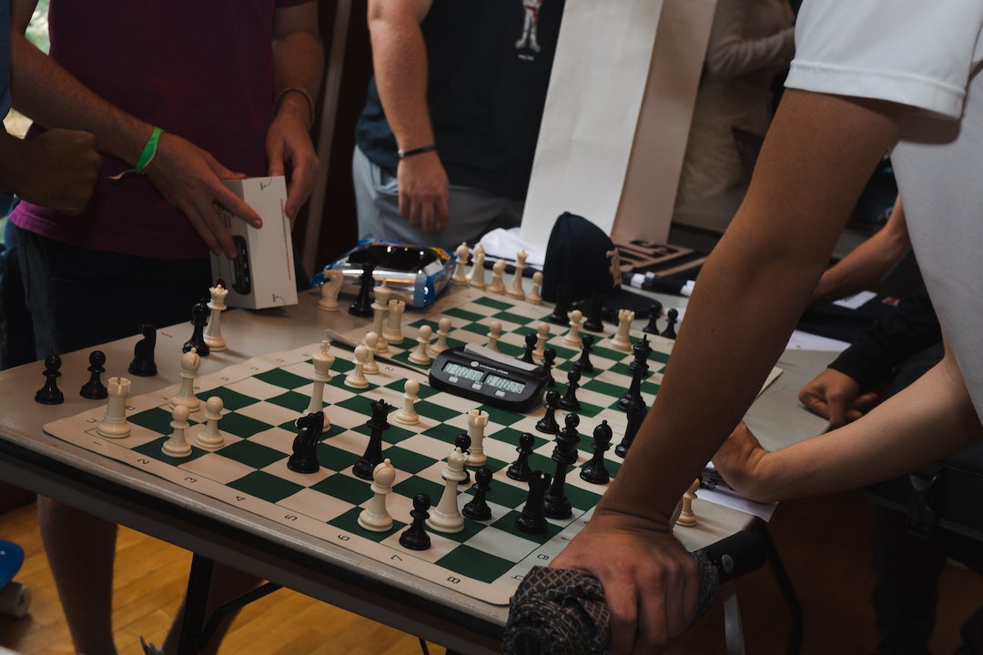 Students playing chess at Student Activities Fair