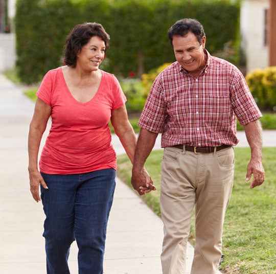 man and woman holding hands