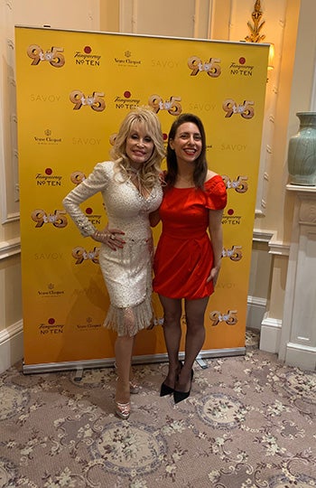 Dolly Parton pictured with Shima Oliaee