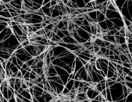 A tangle of unprocessed boron nitride nanotubes seen through a scanning electron microscope. Rice University scientists introduced a method to combine them into fibers using the custom wet-spinning process they developed to make carbon nanotube fibers. (Credit: Pasquali Research Group/Rice University)