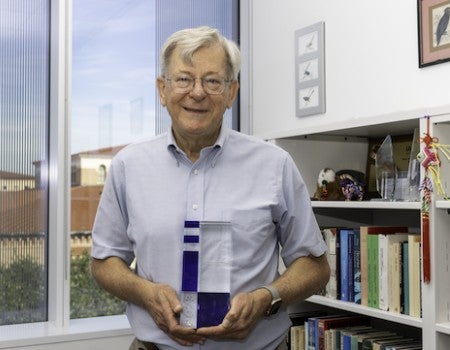 Peter Hartley with award