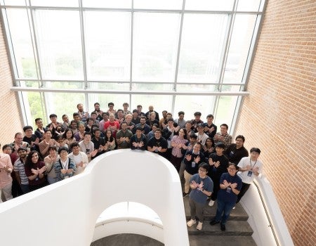 School on Electron Correlations and Topology