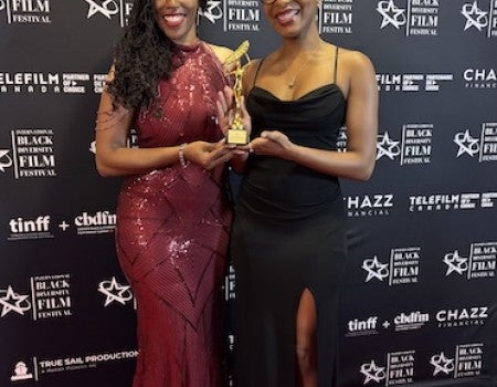 Elizabeth Hordge-Freeman (left) and Tabria Snowden (right), co-directors of Journey Towards Justice at the International Black & Diversity Film Festival in Ontario, Canada.