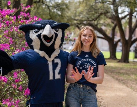 Student with Sammy the Owl