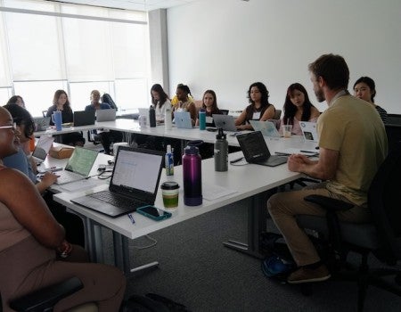 Graduate and prospective graduate students take part in a hands-on session during the STaRT@Rice program, which offered training in statistical methods, data visualization and other research tools.