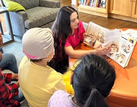 Lucia Noto with group of children