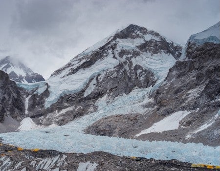 Campsite at Everest base camp surrounded by Himalaya mountains range, Nepal, Asia