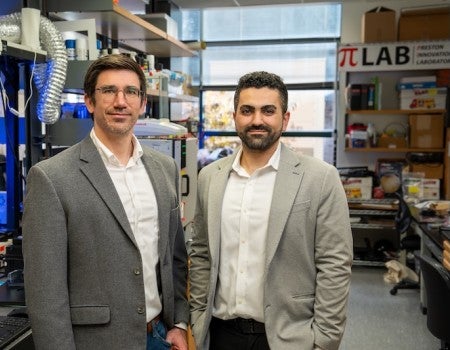 Preston and Rasheed in Preston's lab