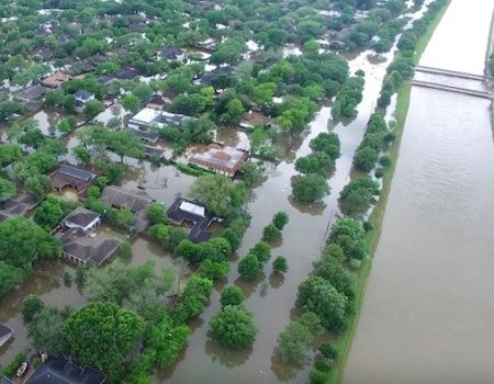Floodwaters surround homes in the Meyerland neighborhood following the April 2016 Tax Day flood in Houston.