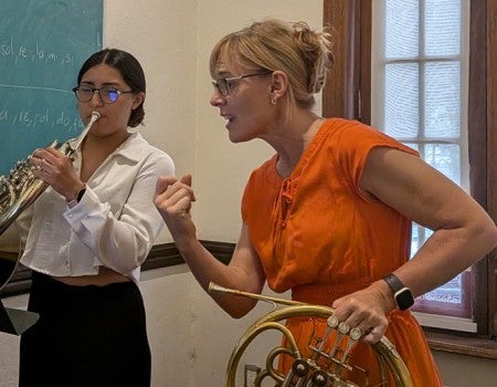 Horn professor Elizabeth Freimuth works with a student at the CAYO workshop in Mexico