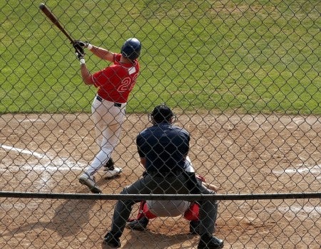 Athletes playing baseball 