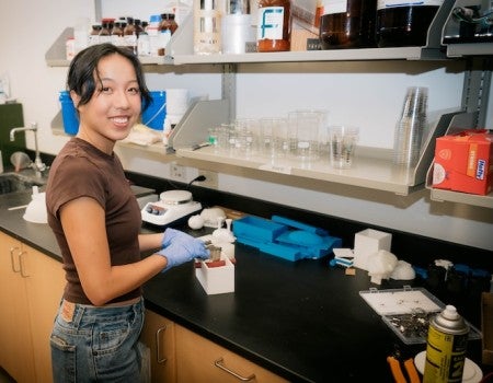 Chihtong “Lily” Lee, a mechanical engineering graduate student in Avila’s lab at Rice and the study’s lead author, with the model of the esophagus and surrounding neck tissue. 