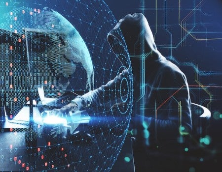 Hacker with computer code.