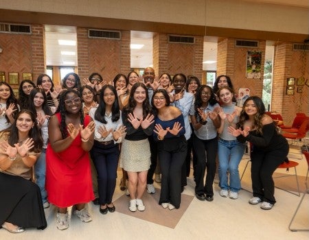 RESP students pose with Rice President Reginald DesRoches