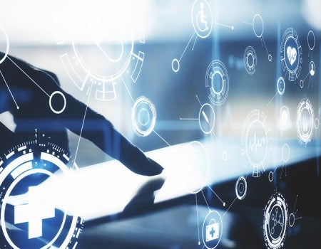 stock image showing an index finger manipulating digital screen