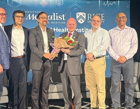 group of men on stage