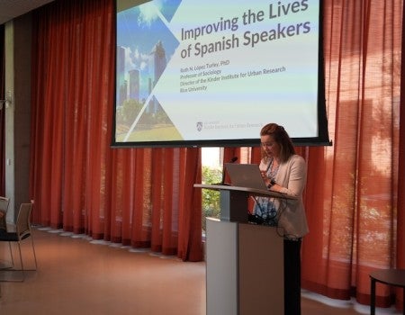Rachel Kimbro, dean of Rice University's School of Social Sciences, welcomes attendees to the Texas-Latin America Social Science Forum on Language and Opportunity Oct. 7.
