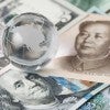 US and Chinese Currency with Glass globe on top