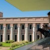 A Rice student sits on the James Turrell Skyspace to study. (Photo by Jeff Fitlow)