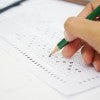 Student bubbling in a scantron