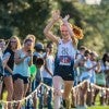 Grace Forbes celebrates as she nears the finish line during the Rice Invitational (Photo by Tommy LaVergne)