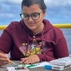 Rice Ph.D. student Debadrita Jana painting microfossils aboard the research vessel JOIDES Resolution in February 2022