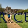 Admitted students and family posing for photos at Rice
