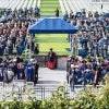All degree candidates were invited to attend the May 7 plenary commencement ceremony in Rice Stadium on a warm Saturday morning, many sporting umbrellas for the sun rather than rain.