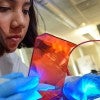 Rice University graduate student Maria Claudia Villegas Kcam filters DNA for an experiment to target “silent” genes in a strain of bacteria that show potential for developing new antibiotics. (Credit: Jeff Fitlow/Rice University)