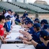 Rice baseball players sign autographs at the team's annual Fan Fest event on Feb. 5, 2023.