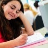 Creative Writing Camp student writes in June 2024.
